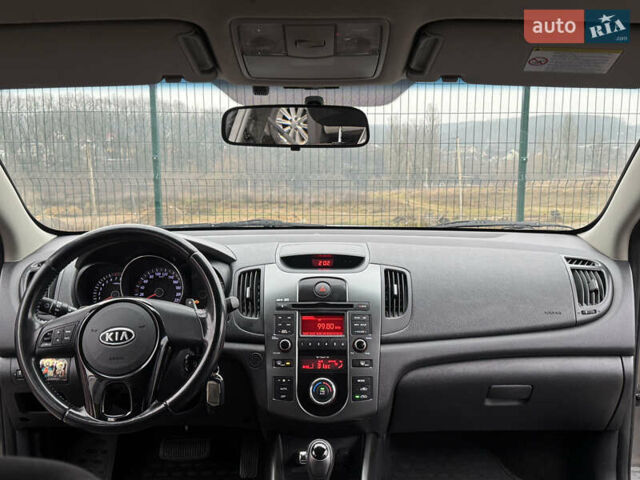 Серый Киа Черато, объемом двигателя 1.6 л и пробегом 141 тыс. км за 9800 $, фото 36 на Automoto.ua