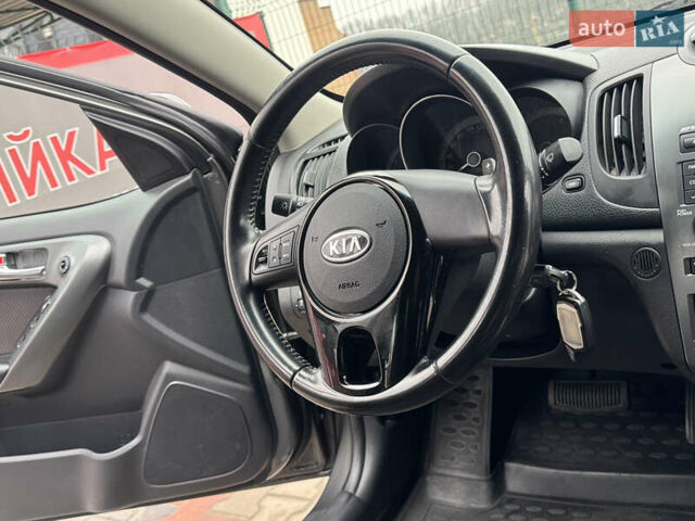 Серый Киа Черато, объемом двигателя 1.6 л и пробегом 141 тыс. км за 9800 $, фото 39 на Automoto.ua
