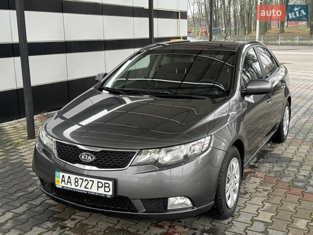 Серый Киа Черато, объемом двигателя 1.6 л и пробегом 141 тыс. км за 9800 $, фото 6 на Automoto.ua