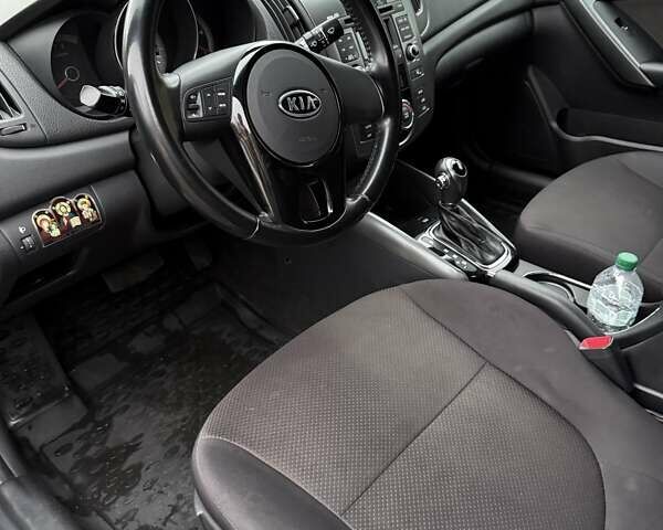 Серый Киа Черато, объемом двигателя 1.59 л и пробегом 141 тыс. км за 9600 $, фото 11 на Automoto.ua