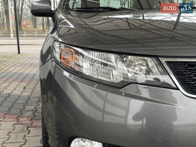 Серый Киа Черато, объемом двигателя 1.6 л и пробегом 141 тыс. км за 9800 $, фото 13 на Automoto.ua