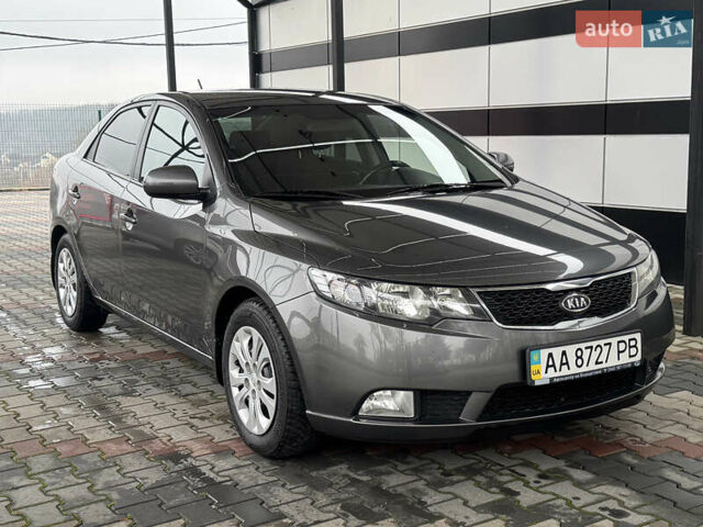 Серый Киа Черато, объемом двигателя 1.6 л и пробегом 141 тыс. км за 9800 $, фото 76 на Automoto.ua