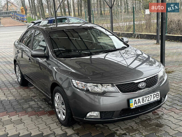 Серый Киа Черато, объемом двигателя 1.6 л и пробегом 141 тыс. км за 9800 $, фото 10 на Automoto.ua