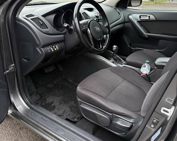Серый Киа Черато, объемом двигателя 1.59 л и пробегом 141 тыс. км за 9600 $, фото 12 на Automoto.ua