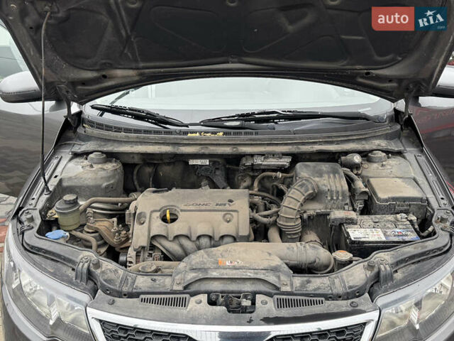 Серый Киа Черато, объемом двигателя 1.6 л и пробегом 141 тыс. км за 9800 $, фото 70 на Automoto.ua