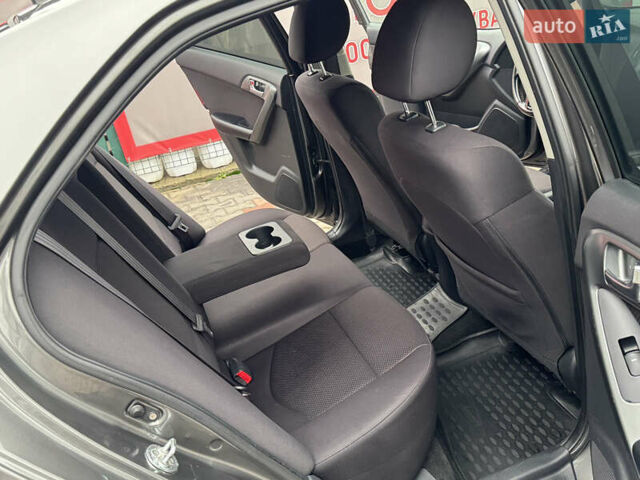 Серый Киа Черато, объемом двигателя 1.6 л и пробегом 141 тыс. км за 9800 $, фото 64 на Automoto.ua