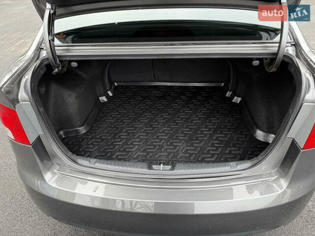 Серый Киа Черато, объемом двигателя 1.6 л и пробегом 141 тыс. км за 9799 $, фото 17 на Automoto.ua