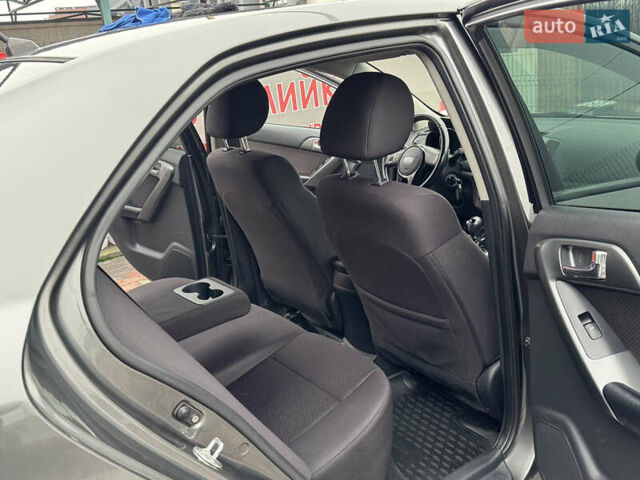 Серый Киа Черато, объемом двигателя 1.6 л и пробегом 141 тыс. км за 9800 $, фото 65 на Automoto.ua