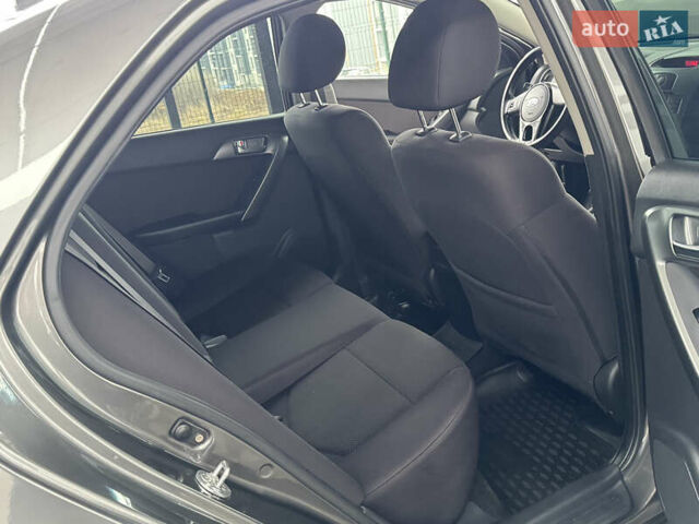 Серый Киа Черато, объемом двигателя 1.6 л и пробегом 141 тыс. км за 9800 $, фото 58 на Automoto.ua