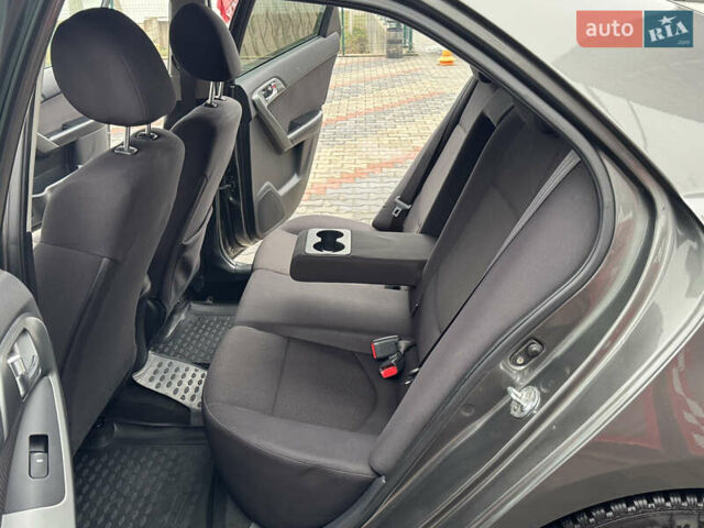 Серый Киа Черато, объемом двигателя 1.6 л и пробегом 141 тыс. км за 9800 $, фото 67 на Automoto.ua