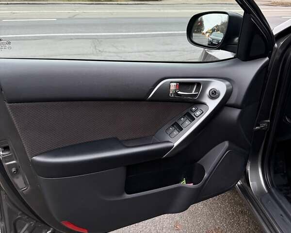 Серый Киа Черато, объемом двигателя 1.59 л и пробегом 141 тыс. км за 9600 $, фото 9 на Automoto.ua