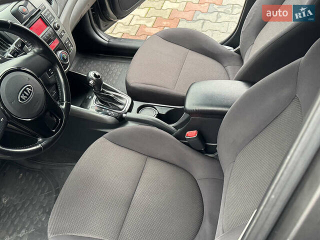 Серый Киа Черато, объемом двигателя 1.6 л и пробегом 141 тыс. км за 9800 $, фото 35 на Automoto.ua