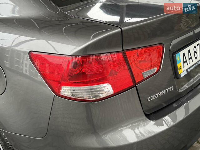 Серый Киа Черато, объемом двигателя 1.6 л и пробегом 141 тыс. км за 9800 $, фото 25 на Automoto.ua