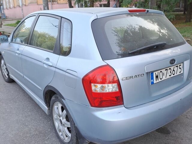 Синий Киа Черато, объемом двигателя 2 л и пробегом 350 тыс. км за 1900 $, фото 3 на Automoto.ua