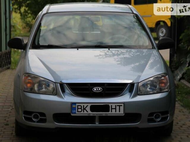 Синий Киа Черато, объемом двигателя 2 л и пробегом 292 тыс. км за 5450 $, фото 6 на Automoto.ua