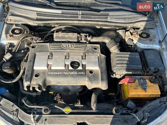 Синий Киа Черато, объемом двигателя 1.6 л и пробегом 350 тыс. км за 3000 $, фото 10 на Automoto.ua