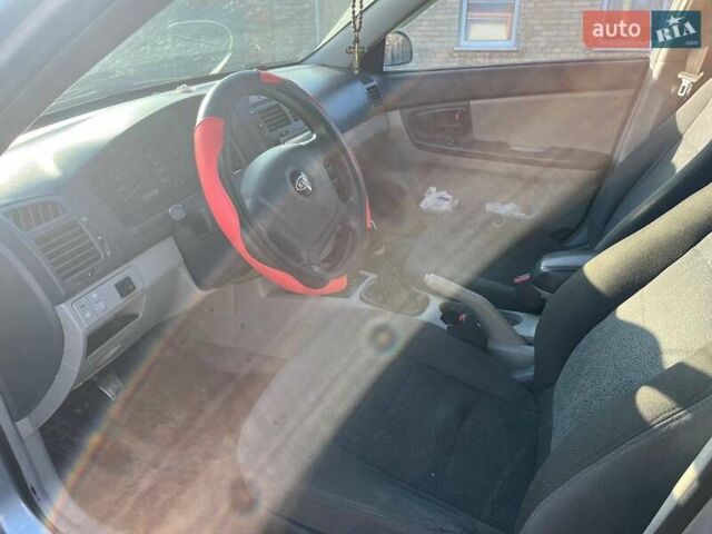 Синий Киа Черато, объемом двигателя 1.6 л и пробегом 350 тыс. км за 3000 $, фото 13 на Automoto.ua