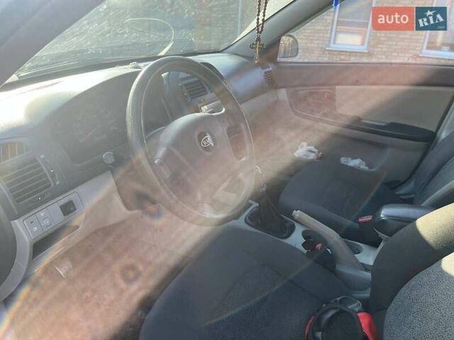 Синий Киа Черато, объемом двигателя 1.6 л и пробегом 350 тыс. км за 3000 $, фото 16 на Automoto.ua