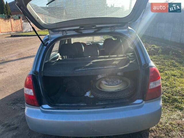 Синий Киа Черато, объемом двигателя 1.6 л и пробегом 350 тыс. км за 3000 $, фото 9 на Automoto.ua