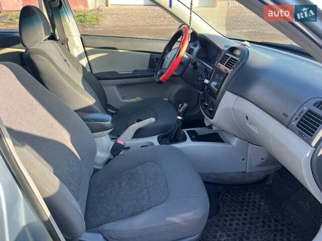 Синий Киа Черато, объемом двигателя 1.6 л и пробегом 350 тыс. км за 3000 $, фото 14 на Automoto.ua