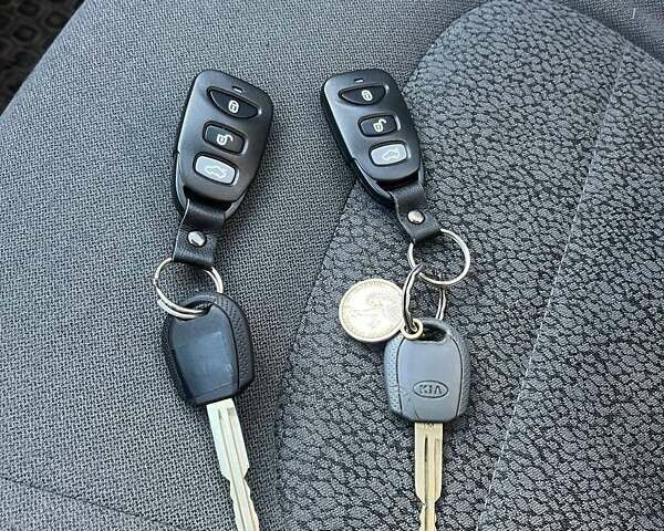 Синий Киа Черато, объемом двигателя 1.6 л и пробегом 350 тыс. км за 3000 $, фото 18 на Automoto.ua