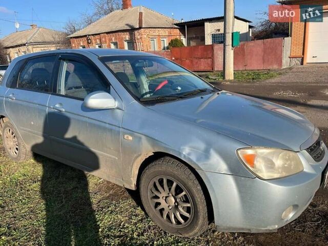 Синий Киа Черато, объемом двигателя 1.6 л и пробегом 350 тыс. км за 3000 $, фото 1 на Automoto.ua