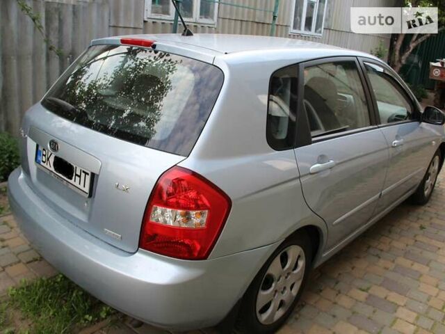 Синий Киа Черато, объемом двигателя 2 л и пробегом 292 тыс. км за 5450 $, фото 7 на Automoto.ua