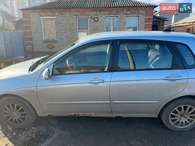 Синий Киа Черато, объемом двигателя 1.6 л и пробегом 350 тыс. км за 3000 $, фото 6 на Automoto.ua