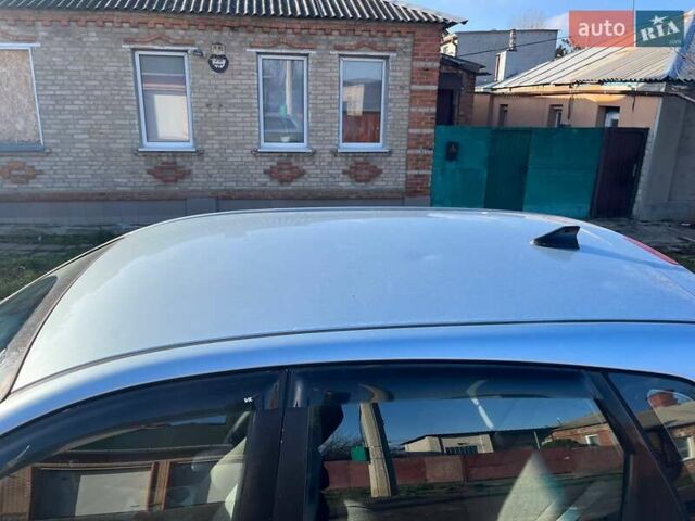 Синий Киа Черато, объемом двигателя 1.6 л и пробегом 350 тыс. км за 3000 $, фото 8 на Automoto.ua