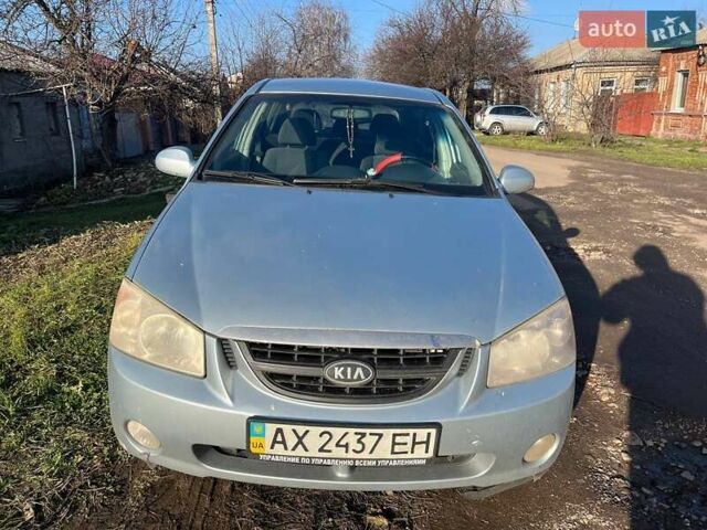 Синий Киа Черато, объемом двигателя 1.6 л и пробегом 350 тыс. км за 3000 $, фото 2 на Automoto.ua