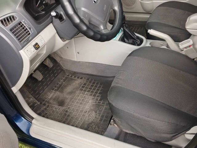 Синій Кіа Черато, об'ємом двигуна 1.6 л та пробігом 167 тис. км за 3084 $, фото 6 на Automoto.ua