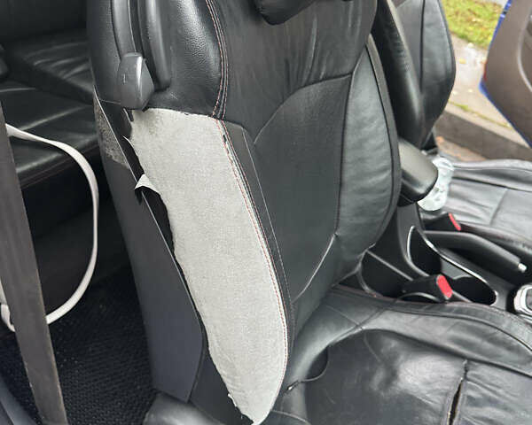 Синий Киа Черато, объемом двигателя 2 л и пробегом 190 тыс. км за 7000 $, фото 19 на Automoto.ua