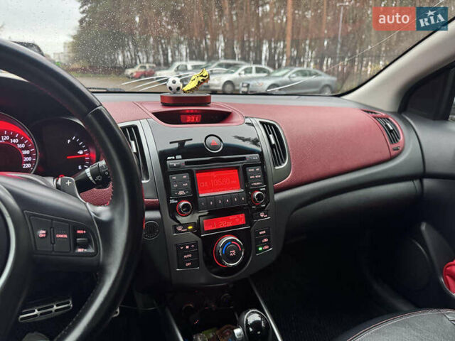 Синий Киа Черато, объемом двигателя 2 л и пробегом 190 тыс. км за 7000 $, фото 12 на Automoto.ua