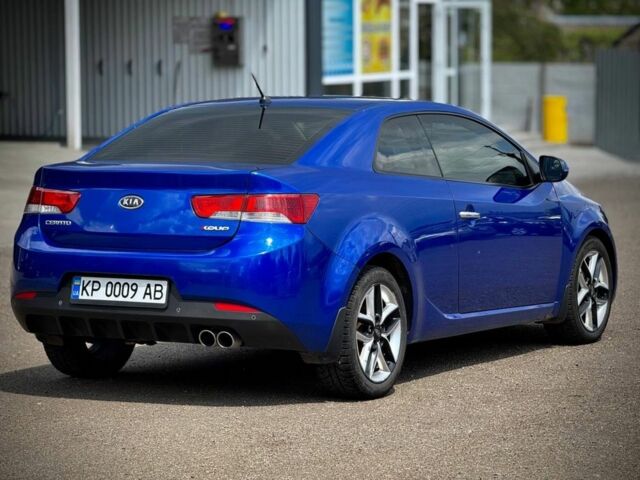 Синій Кіа Черато, об'ємом двигуна 2 л та пробігом 225 тис. км за 6400 $, фото 4 на Automoto.ua