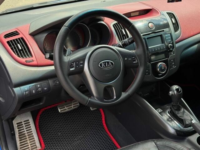 Синій Кіа Черато, об'ємом двигуна 2 л та пробігом 225 тис. км за 6400 $, фото 7 на Automoto.ua