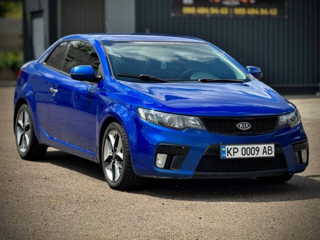 Синій Кіа Черато, об'ємом двигуна 2 л та пробігом 225 тис. км за 6400 $, фото 1 на Automoto.ua