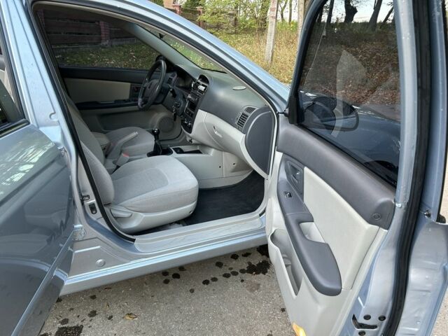 Синій Кіа Черато, об'ємом двигуна 1.6 л та пробігом 255 тис. км за 3750 $, фото 5 на Automoto.ua