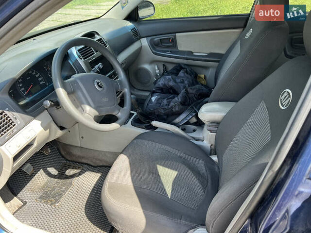 Синий Киа Черато, объемом двигателя 1.6 л и пробегом 200 тыс. км за 2850 $, фото 14 на Automoto.ua