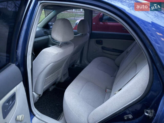 Синій Кіа Черато, об'ємом двигуна 1.6 л та пробігом 355 тис. км за 3400 $, фото 8 на Automoto.ua