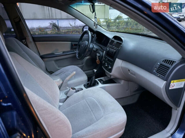 Синій Кіа Черато, об'ємом двигуна 1.6 л та пробігом 355 тис. км за 3400 $, фото 9 на Automoto.ua