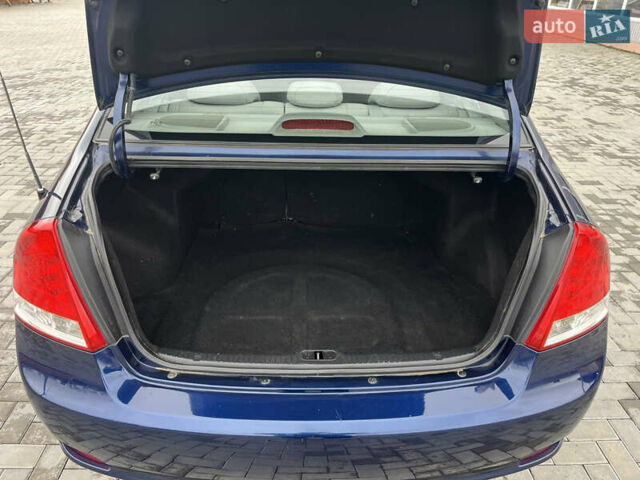 Синий Киа Черато, объемом двигателя 1.59 л и пробегом 190 тыс. км за 4500 $, фото 16 на Automoto.ua