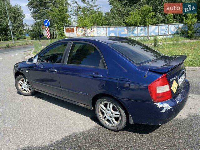 Синий Киа Черато, объемом двигателя 1.6 л и пробегом 200 тыс. км за 2850 $, фото 2 на Automoto.ua