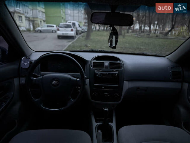 Синій Кіа Черато, об'ємом двигуна 1.6 л та пробігом 355 тис. км за 3400 $, фото 12 на Automoto.ua