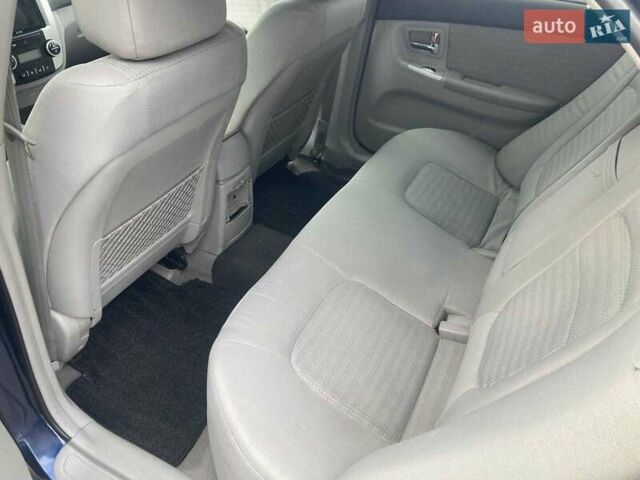 Синій Кіа Черато, об'ємом двигуна 1.98 л та пробігом 250 тис. км за 5700 $, фото 5 на Automoto.ua