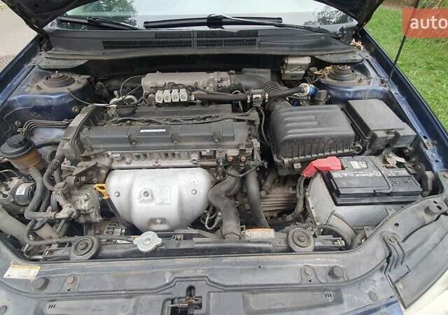 Синій Кіа Черато, об'ємом двигуна 2 л та пробігом 233 тис. км за 3900 $, фото 12 на Automoto.ua