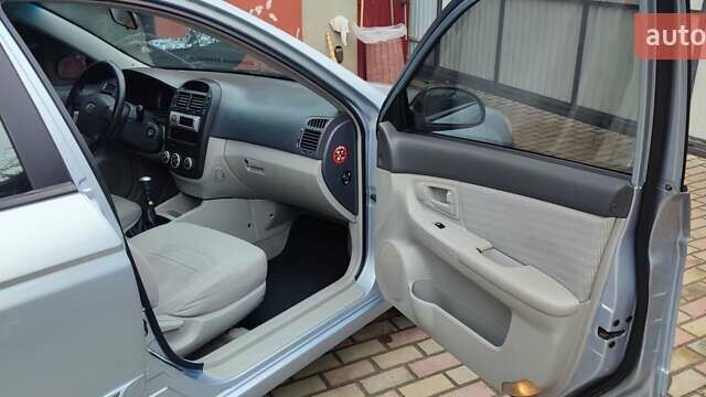 Синий Киа Черато, объемом двигателя 1.59 л и пробегом 161 тыс. км за 4200 $, фото 10 на Automoto.ua