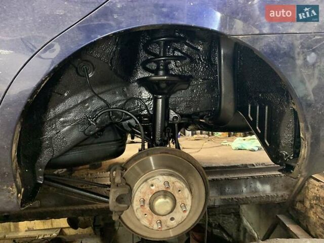 Синий Киа Черато, объемом двигателя 2 л и пробегом 233 тыс. км за 5100 $, фото 20 на Automoto.ua