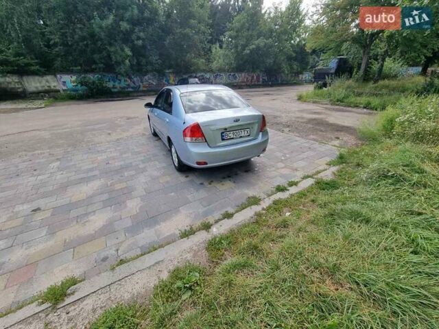 Синий Киа Черато, объемом двигателя 1.6 л и пробегом 255 тыс. км за 3300 $, фото 5 на Automoto.ua