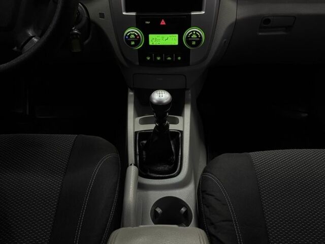 Синий Киа Черато, объемом двигателя 1.6 л и пробегом 214 тыс. км за 5600 $, фото 14 на Automoto.ua