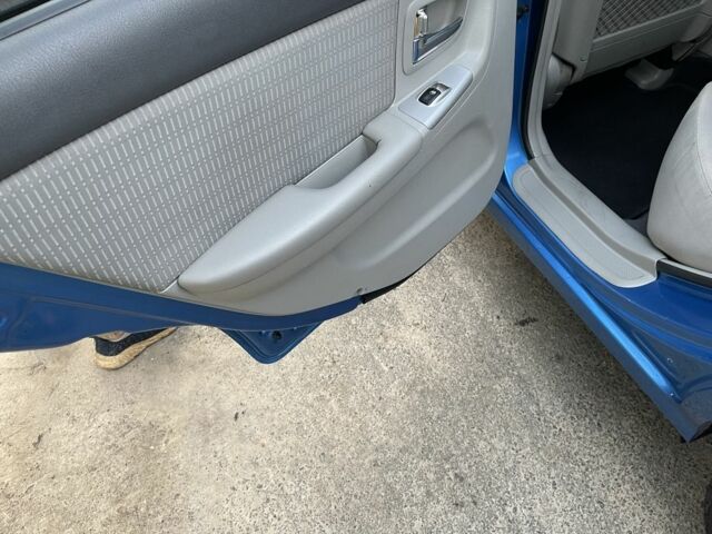 Синий Киа Черато, объемом двигателя 1.6 л и пробегом 22 тыс. км за 3100 $, фото 14 на Automoto.ua